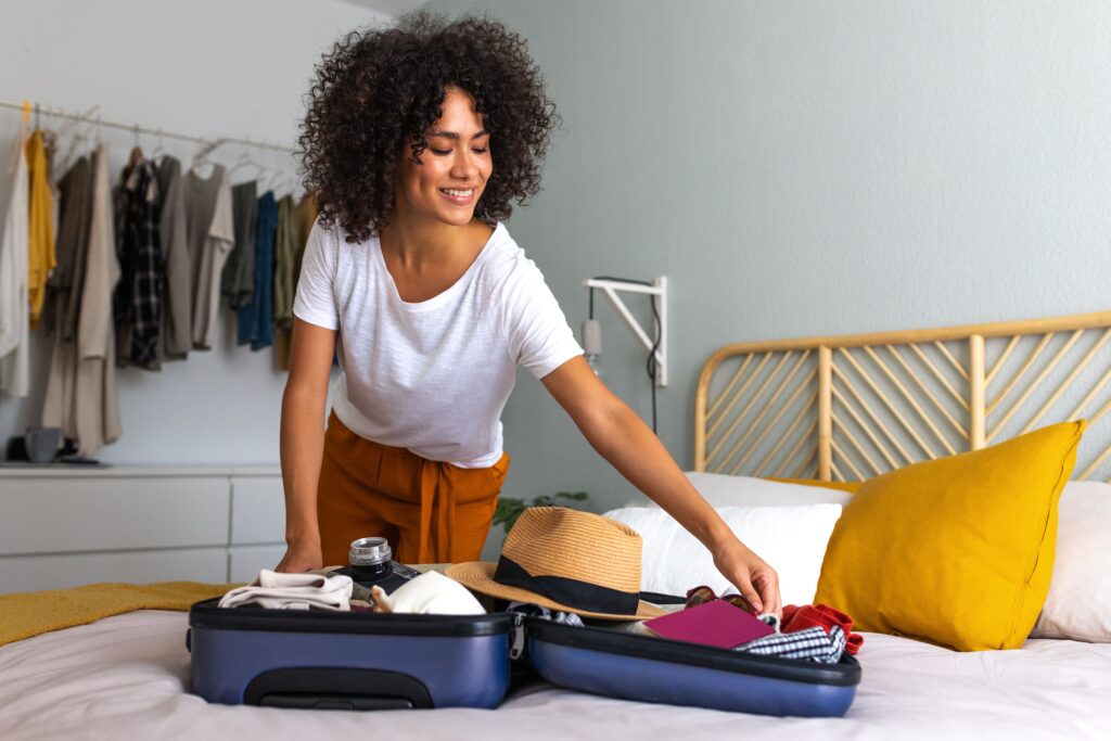 Woman packing a suitcase