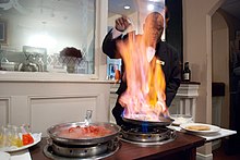 Bourbon Street | Banana's Foster is prepared tableside